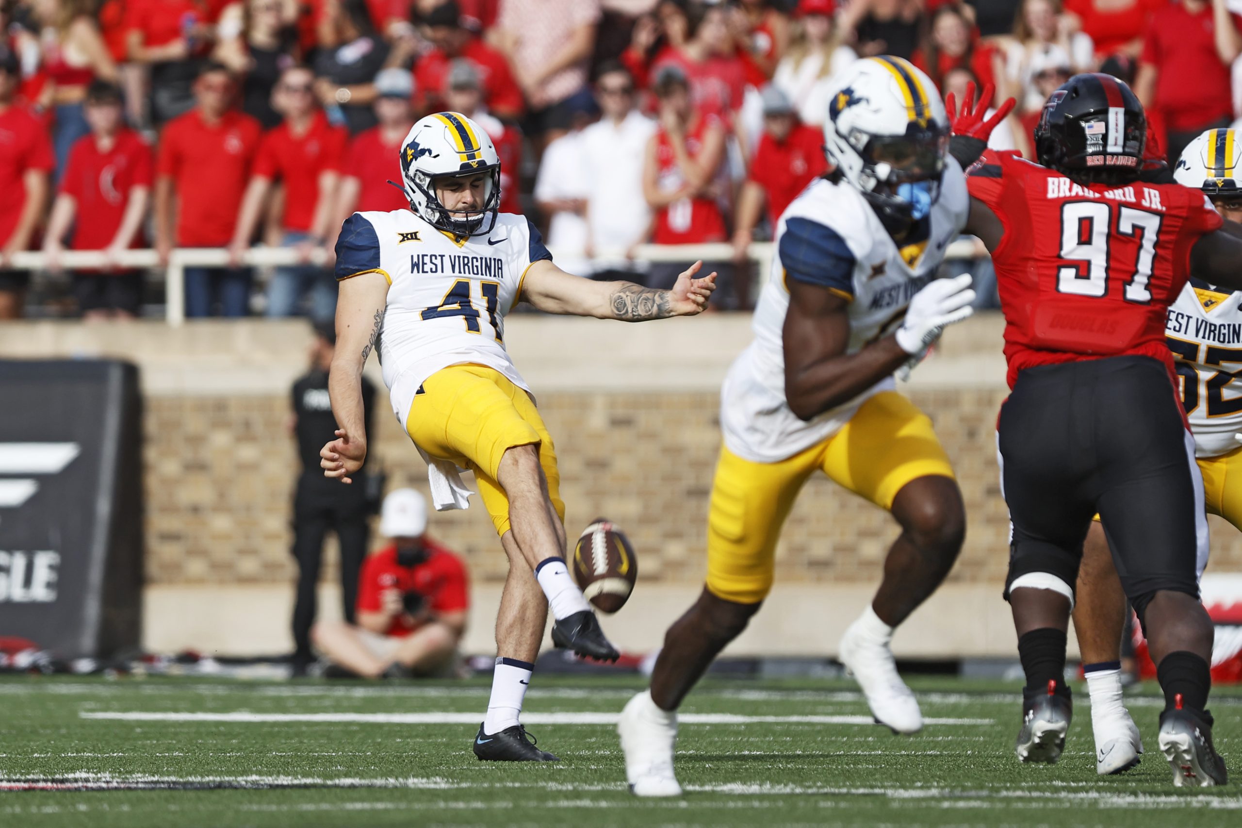 Kicked to the curb: WVU's Straw changing punting style to more traditional look
